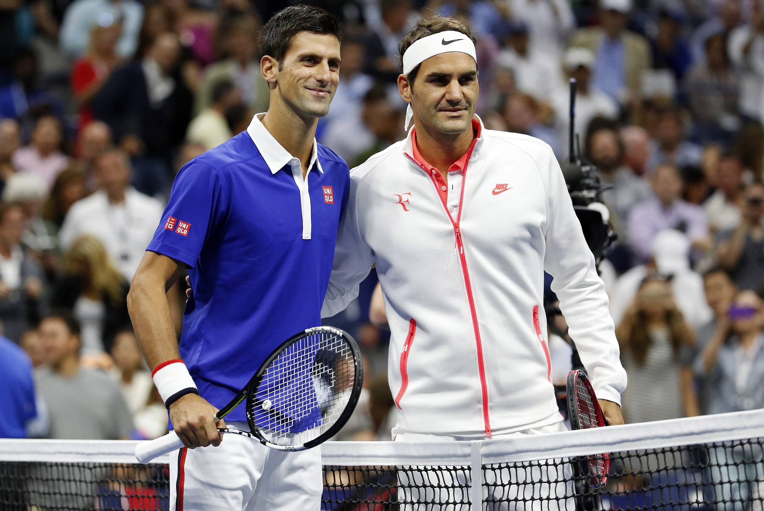 Novak Djokovic, of Serbia, left, and Roger Federer, of Switzerland, pose for photos before the start of the men's championship match of the U.S. Open tennis tournament, Sunday, Sept. 13, 2015, in New York. (AP Photo/Julio Cortez) Novak Djokovic, of Serbia, left, and Roger Federer, of Switzerland, pose for photos before the start of the men's championship match of the U.S. Open tennis tournament, Sunday, Sept. 13, 2015, in New York. (AP Photo/Julio Cortez)