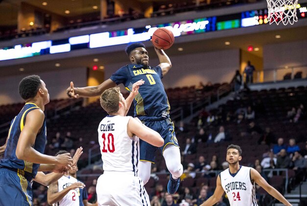 Nov 27, 2015; Las Vegas, NV, USA; California Golden Bears forward Jaylen Brown (0) flies through the air to dunk the ball while Richmond Spiders forward TJ Cline (10) defends during the first half at Orleans Arena. Mandatory Credit: Joshua Dahl-USA TODAY Sports