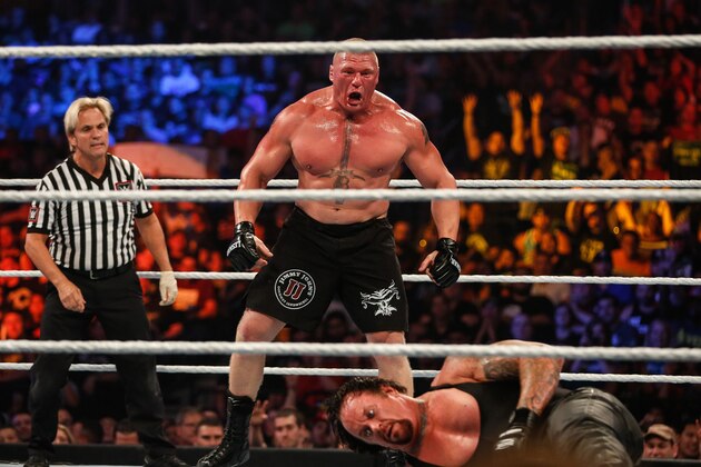 NEW YORK, NY - AUGUST 23:  Brock Lesnar and The Undertaker battle it out at the WWE SummerSlam 2015 at Barclays Center of Brooklyn on August 23, 2015 in New York City.  (Photo by JP Yim/Getty Images)