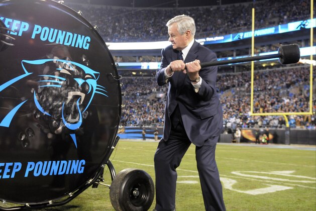 Carolina Panthers owner Jerry Richardson  hits a drum before the NFL football NFC Championship game against the Arizona Cardinals, Sunday, Jan. 24, 2016, in Charlotte, N.C. (AP Photo/Mike McCarn)