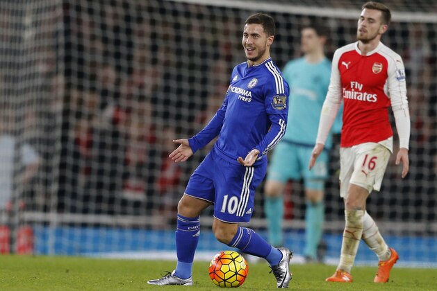 Chelsea's Eden Hazard, left, reacts to a decision by referee Mark Clattenburg during the English Premier League soccer match between Arsenal and Chelsea at the Emirates stadium in London, Sunday, Jan. 24, 2016.(AP Photo/Frank Augstein)