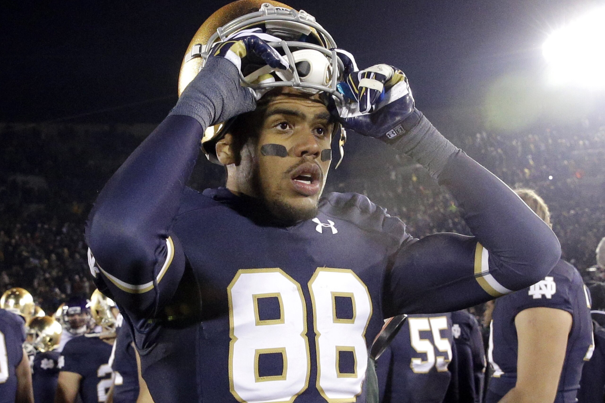 Notre Dame wide receiver Corey Robinson (88) walks off the field after after Notre Dame's 43-40 loss to Northwestern in an NCAA college football game in South Bend, Ind., Saturday, Nov. 15, 2014. Northwestern won 43-40 in overtime. (AP Photo/Nam Y. Huh)