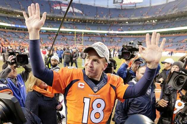 Denver Broncos quarterback Peyton Manning waves to spectators following the NFL football AFC Championship game between the Denver Broncos and the New England Patriots, Sunday, Jan. 24, 2016, in Denver. The Broncos defeated the Patriots 20-18 to advance to the Super Bowl. (AP Photo/Charlie Riedel)