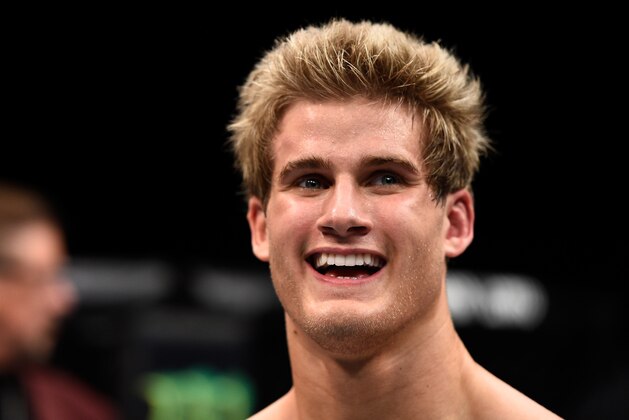 LAS VEGAS, NEVADA - DECEMBER 10:  Sage Northcutt celebrates his win over Cody Pfister in their lightweight bout during the UFC Fight Night event at The Chelsea at the Cosmopolitan of Las Vegas on December 10, 2015 in Las Vegas, Nevada.  (Photo by Jeff Bottari/Zuffa LLC/Zuffa LLC via Getty Images)