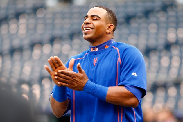 KANSAS CITY, MO - OCTOBER 26:  Yoenis Cespedes #52 of the New York Mets claps during the Mets workout the day before Game 1 of the 2015 World Series between the Kansas City Royals and Mets at Kauffman Stadium on October 26, 2015 in Kansas City, Missouri.  (Photo by Maxx Wolfson/Getty Images)