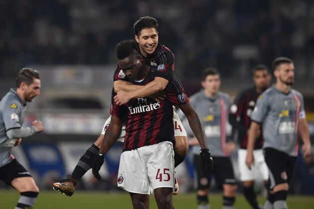 TURIN, ITALY - JANUARY 26:  Mario Balotelli (C) of AC Milan celebrates after scoring the opening goal from the penalty spot with team mate  Jose Mauri during the TIM Cup match between US Alessandria and AC Milan at Olimpico Stadium on January 26, 2016 in Turin, Italy.  (Photo by Valerio Pennicino/Getty Images)