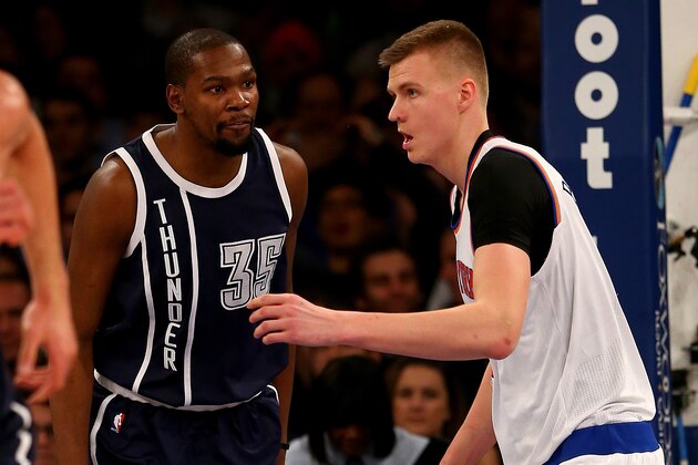 NEW YORK, NY - JANUARY 26:  Kevin Durant #35 of the Oklahoma City Thunder has words for Kristaps Porzingis #6 of the New York Knicks after Durant dunked the ball over him in the second half at Madison Square Garden on January 26, 2016 in New York City.The Oklahoma City Thunder defeated the New York Knicks 128-122 in overtime. NOTE TO USER: User expressly acknowledges and agrees that, by downloading and or using this photograph, User is consenting to the terms and conditions of the Getty Images License Agreement.  (Photo by Elsa/Getty Images)