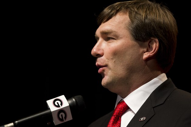 Alabama defensive coordinator Kirby Smart speaks during a press conference where he was introduced as Georgia's new head football coach  Monday, Dec. 7, 2015, in Athens, Ga. Smart will stay with the Crimson Tide through the NCAA college playoffs. (AP Photo/John Bazemore)