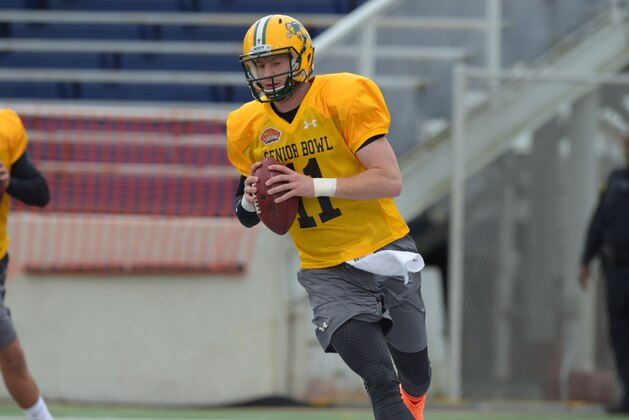 Jan 26, 2016; Mobile, AL, USA; North squad quarterback Carson Wentz of North Dakota State (11) and quarterback Cody Kessler of USC (6) roll out during Senior Bowl practice at Ladd-Peebles Stadium. Mandatory Credit: Glenn Andrews-USA TODAY Sports