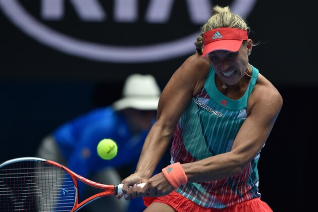 Germany's Angelique Kerber returns against Belarus's Victoria Azarenka during their women's singles on day ten of the 2016 Australian Open tennis tournament in Melbourne on January 27, 2016. AFP PHOTO / SAEED KHAN-- IMAGE RESTRICTED TO EDITORIAL USE - STRICTLY NO COMMERCIAL USE / AFP / SAEED KHAN        (Photo credit should read SAEED KHAN/AFP/Getty Images)