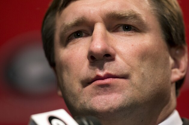 Alabama defensive coordinator Kirby Smart listens to a question from a reporter during a press conference where he was introduced as Georgia's new head football coach  Monday, Dec. 7, 2015, in Athens, Ga. Smart will stay with the Crimson Tide through the NCAA college playoffs. (AP Photo/John Bazemore)