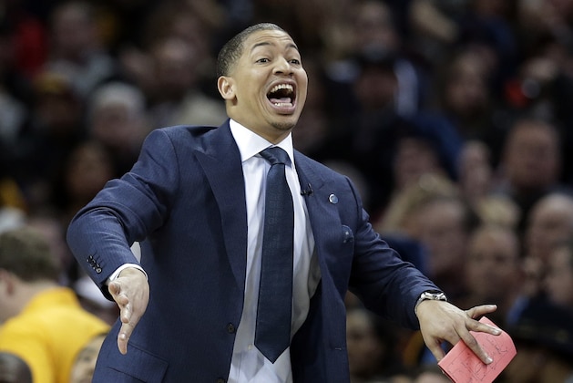 Cleveland Cavaliers head coach Tyronn Lue yells to players in the first half of an NBA basketball game against the Chicago Bulls, Saturday, Jan. 23, 2016, in Cleveland. (AP Photo/Tony Dejak)