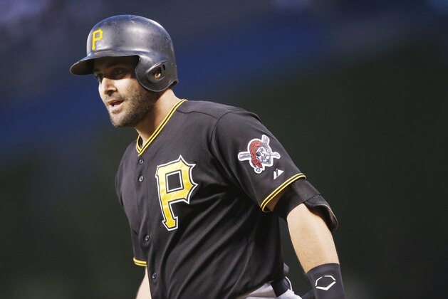 Pittsburgh Pirates catcher Francisco Cervelli (29) reacts after striking out against the Colorado Rockies in the first inning of a baseball game Tuesday, Sept. 22, 2015, in Denver. (AP Photo/David Zalubowski)