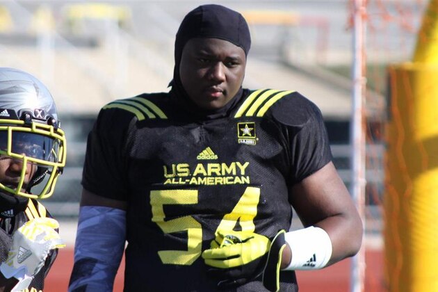 Oklahoma City 4-star offensive lineman Tramonda Moore dedicated his senior season to C.J. "Cleato" Davis, who died from an automobile accident in April. Moore wore No. 54 this past season and at the U.S. Army All-American Bowl to honor Davis, who wore the number.
