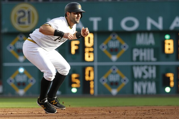 Pittsburgh Pirates' Francisco Cervelli takes a lead off second after hitting a double in the sixth inning of a baseball game against the Cincinnati Reds, Sunday, Oct. 4, 2015, in Pittsburgh. (AP Photo/Keith Srakocic)