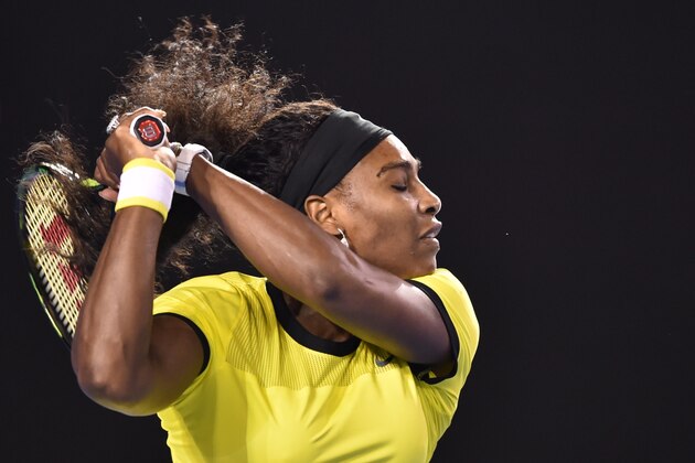 Serena Williams of the US hits a return against Poland's Agnieszka Radwanska during their women's singles semi-final match on day eleven of the 2016 Australian Open tennis tournament in Melbourne on January 28, 2016. AFP PHOTO / PETER PARKS-- IMAGE RESTRICTED TO EDITORIAL USE - STRICTLY NO COMMERCIAL USE / AFP / PETER PARKS        (Photo credit should read PETER PARKS/AFP/Getty Images)
