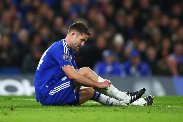 LONDON, ENGLAND - DECEMBER 05: Gary Cahill of Chelsea arranges his shin guards after receiving medical treatment during the Barclays Premier League match between Chelsea and A.F.C. Bournemouth at Stamford Bridge on December 5, 2015 in London, England.  (Photo by Ian Walton/Getty Images)