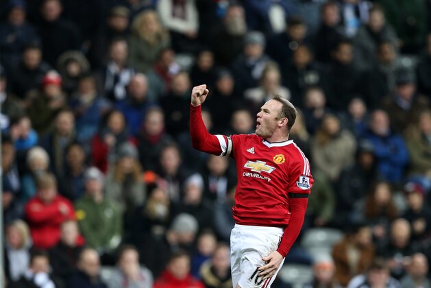 Manchester United's Wayne Rooney celebrates his goal during the English Premier League soccer match between Newcastle United and Manchester United at St James' Park, Newcastle, England, Tuesday, Jan. 12, 2015. (AP Photo/Scott Heppell)