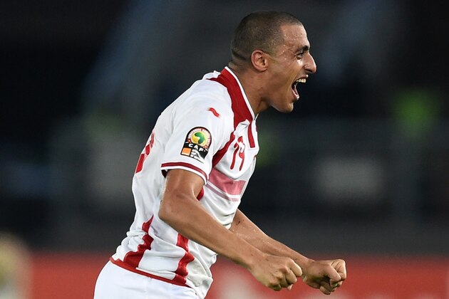Tunisia's forward Ahmed Akaichi celebrates after scoring a goal during the 2015 African Cup of Nations quarter-final football match between Equatorial Guinea and Tunisia in Bata on January 31, 2015.  AFP PHOTO / CARL DE SOUZA        (Photo credit should read CARL DE SOUZA/AFP/Getty Images)
