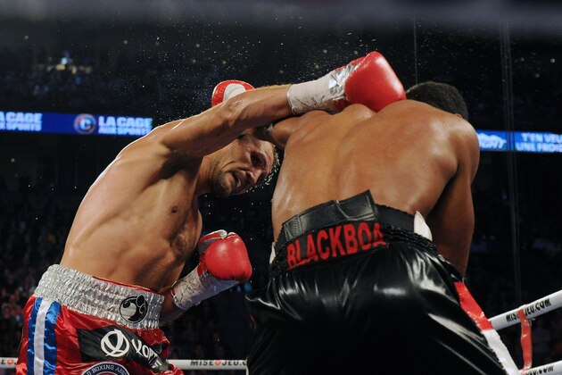 MONTREAL, QC - MARCH 14:  Sergey Kovalev (left) lands a head shot on Jean Pascal during their unified light heavyweight championship bout at the Bell Centre on March 14, 2015 in Montreal, Quebec, Canada.  (Photo by Richard Wolowicz/Getty Images)