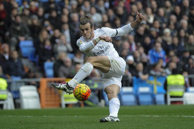Real Madrid's Welsh forward Gareth Bale kicks the ball during the Spanish league football match Real Madrid CF vs Real Sporting de Gijon at the Santiago Bernabeu stadium in Madrid on January 17, 2016.   AFP PHOTO/ PEDRO ARMESTRE / AFP / PEDRO ARMESTRE        (Photo credit should read PEDRO ARMESTRE/AFP/Getty Images)