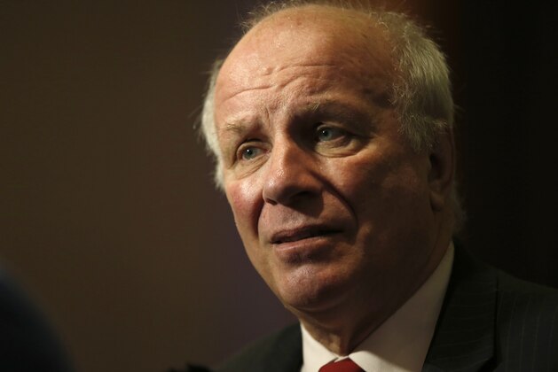 Greg Dyke, Chairman of the English Football Association, talks to the media at the Royal garden Hotel in London Tuesday, Jan. 5, 2016. (AP Photo/Alastair Grant)