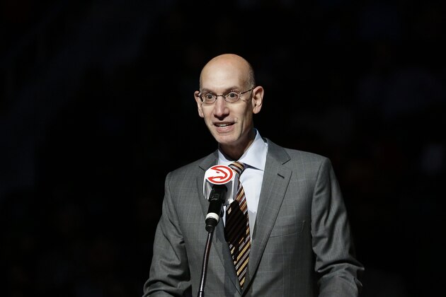 NBA Commissioner Adam Silver speaks at a halftime ceremony retiring the number of former Atlanta Hawks' Dikembe Mutombo at an NBA basketball game between the Hawks and the Boston Celtics Tuesday, Nov. 24, 2015, in Atlanta. (AP Photo/David Goldman)