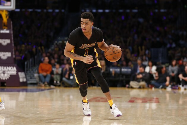 Los Angeles Lakers' D'Angelo Russell dribbles the ball against the Philadelphia 76ers during the second half of an NBA basketball game, Friday, Jan. 1, 2016, in Los Angeles. The Lakers won 93-84. (AP Photo/Danny Moloshok)