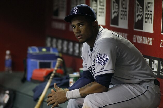 PHOENIX, AZ - SEPTEMBER 13:  Rymer Liriano #7 of the San Diego Padres looks on from the dugout during the eighth inning of a MLB game against the Arizona Diamondbacks at Chase Field on September 13, 2014 in Phoenix, Arizona. The Diamondbacks defeated the Padres 10-4.  (Photo by Ralph Freso/Getty Images)