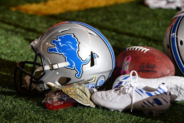 DETROIT, MI - NOVEMBER 22:  A detailed view of a Detroit Lions football helmet, official Wilson football and shoes sitting on the sidelines during the game against the Oakland Raiders at Ford Field on November 22, 2015 in Detroit, Michigan. The Lions defeated the Raiders 18-13.  (Photo by Mark Cunningham/Detroit Lions/Getty Images)