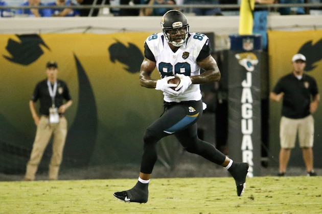 Jacksonville Jaguars tight end Marcedes Lewis (89) runs against the Detroit Lions after a reception during the first half of an NFL preseason football game in Jacksonville, Fla., Friday, Aug. 28, 2015.(AP Photo/Stephen B. Morton)