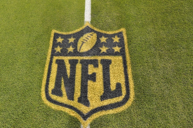 A general view of an NFL logo on the 50-yard line prior to an NFL football game between the Cleveland Browns and the Baltimore Ravens Monday, Nov. 30, 2015, in Cleveland. Baltimore won 33-27. (AP Photo/David Richard)