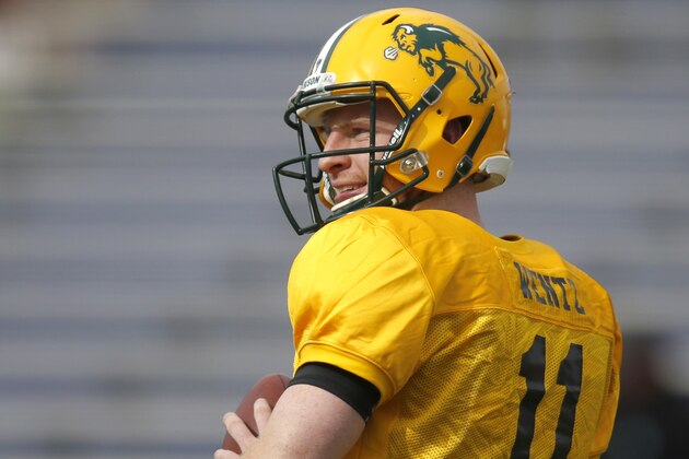 North Dakota State quarterback Carson Wentz (11), runs through drills during NCAA college football practice for the Senior Bowl, Thursday, Jan. 28, 2016, at Ladd–Peebles Stadium, in Mobile, Ala. (AP Photo/Brynn Anderson)
