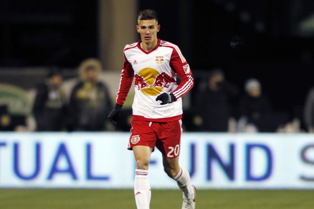 New York Red Bulls defender Matt Miazga carries the ball against the Columbus Crew during the first leg of the MLS soccer Eastern Conference championship in Columbus, Ohio, Sunday, Nov. 22, 2015. The Crew won 2-0. (AP Photo/Paul Vernon)