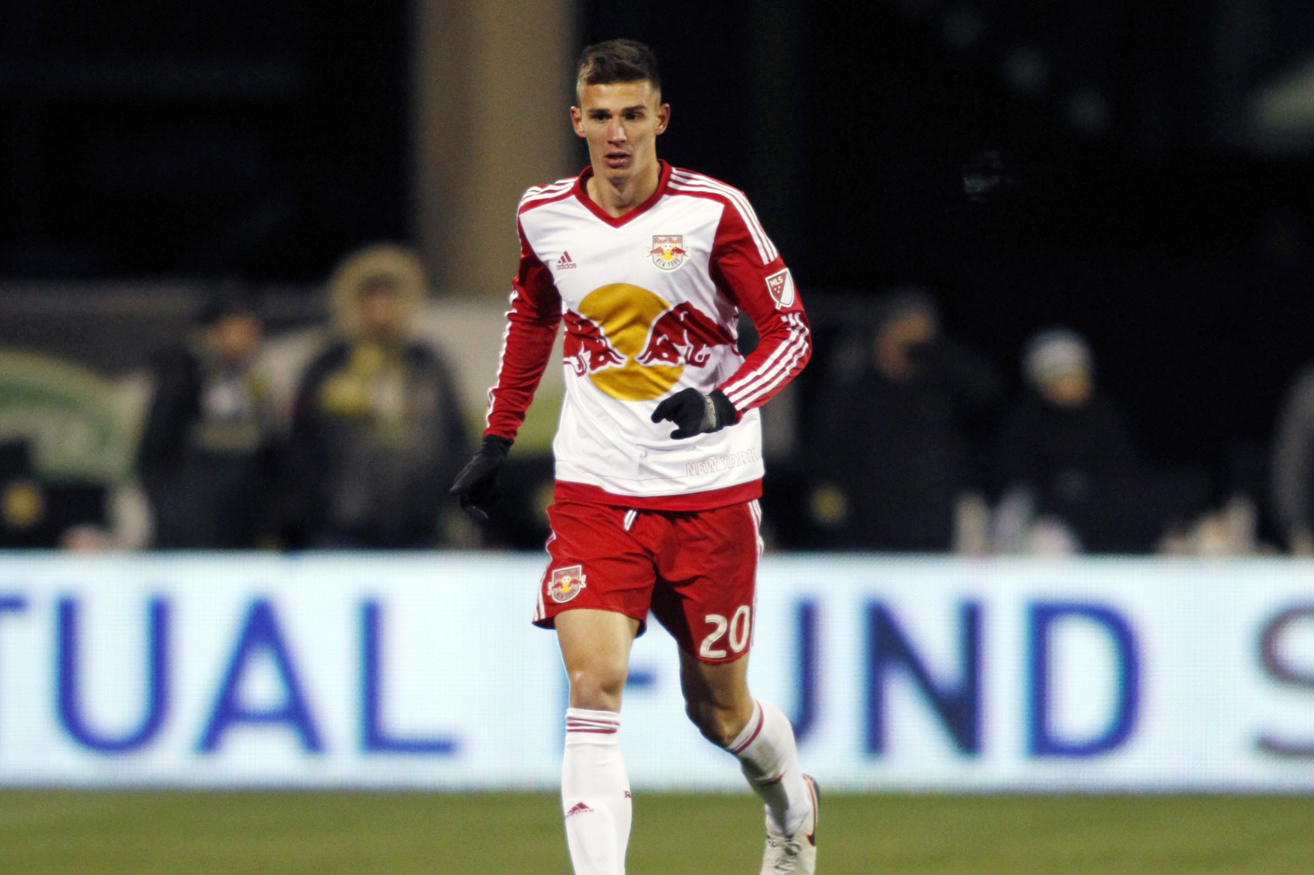 New York Red Bulls defender Matt Miazga carries the ball against the Columbus Crew during the first leg of the MLS soccer Eastern Conference championship in Columbus, Ohio, Sunday, Nov. 22, 2015. The Crew won 2-0. (AP Photo/Paul Vernon)