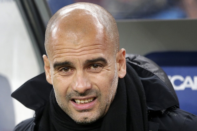 Bayern head coach Pep Guardiola arrives for the German Bundesliga soccer match between Hamburger SV and FC Bayern Munich in Hamburg, Germany, Friday, Jan. 22, 2016. (AP Photo/Michael Sohn)