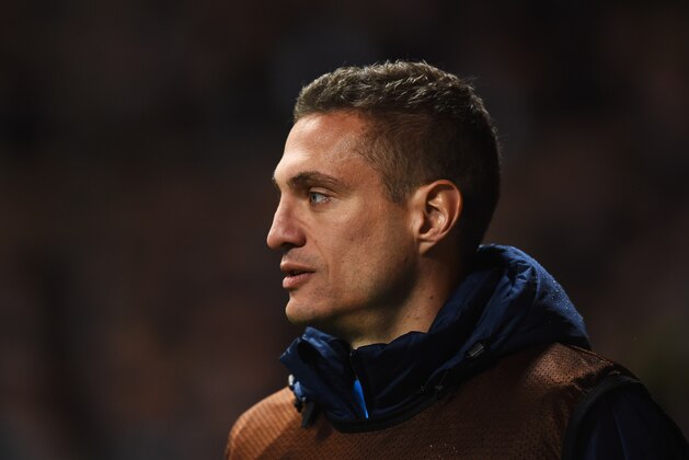 GLASGOW, SCOTLAND - FEBRUARY 19:  Substitute Nemanja Vidic of Inter Milan looks on during the UEFA Europa League Round of 32 first leg match between Celtic FC and FC Internazionale Milano at Celtic Park Stadium on February 19, 2015 in Glasgow, United Kingdom.  (Photo by Laurence Griffiths/Getty Images)