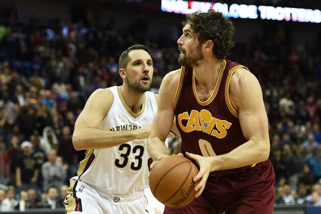 NEW ORLEANS, LA - DECEMBER 04:  Kevin Love #0 of the Cleveland Cavaliers is defended by Ryan Anderson #33 of the New Orleans Pelicans during a game at the Smoothie King Center on December 4, 2015 in New Orleans, Louisiana. The Pelicans defeated the Cavaliers in overtime 114-108. NOTE TO USER: User expressly acknowledges and agrees that, by downloading and or using this photograph, User is consenting to the terms and conditions of the Getty Images License Agreement.  (Photo by Stacy Revere/Getty Images)