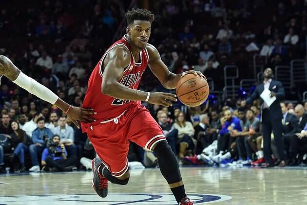 Jan 14, 2016; Philadelphia, PA, USA; Chicago Bulls guard Jimmy Butler (21) moves toward the net during the fourth quarter of the game against the Philadelphia 76ers at the Wells Fargo Center. The Chicago Bulls won the game 115-111 in overtime. Mandatory Credit: John Geliebter-USA TODAY Sports