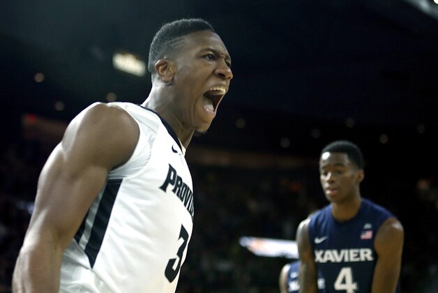 PROVIDENCE, RI - JANUARY 26:  Kris Dunn #3 of the Providence Friars reacts against the Xavier Musketeers in the first half on January 26, 2016, at the Dunkin' Donuts Center in Providence, Rhode Island. (Photo by Jim Rogash/Getty Images)