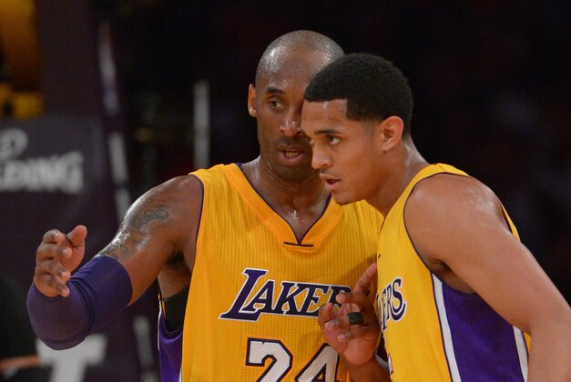 Jan 28, 2016; Los Angeles, CA, USA; Los Angeles Lakers forward Kobe Bryant (24) talks to guard Jordan Clarkson (6) in the second half against the Chicago Bulls at Staples Center. The Bulls won 114-91. Mandatory Credit: Jayne Kamin-Oncea-USA TODAY Sports