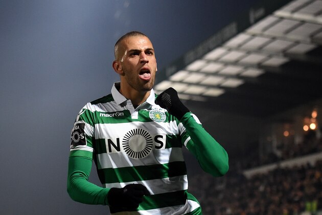 Sporting's Algerian forward Islam Slimani celebrates after scoring a goal during the Portuguese league football match FC Pacos de Ferreira vs Sporting CP at the Capital do Movel stadium in Pacos de Ferreira on January 23, 2016.  AFP PHOTO / FRANCISCO LEONG / AFP / FRANCISCO LEONG        (Photo credit should read FRANCISCO LEONG/AFP/Getty Images)