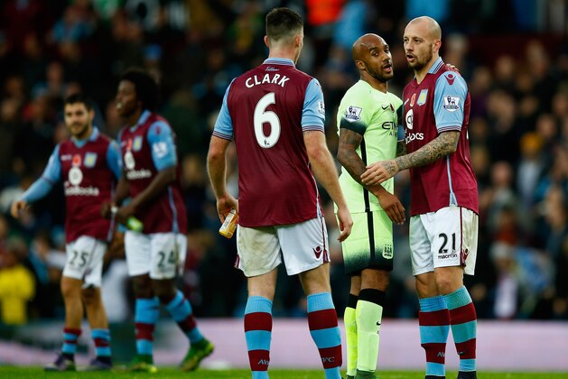 BIRMINGHAM, ENGLAND - NOVEMBER 08:  Fabian Delph of Manchester City (c) and Ciaran Clark of Aston Villa (L) exchange words as Alan Hutton of Aston Villa intervenes following the Barclays Premier League match between Aston Villa and Manchester City at Villa Park on November 8, 2015 in Birmingham, England.  (Photo by Laurence Griffiths/Getty Images)
