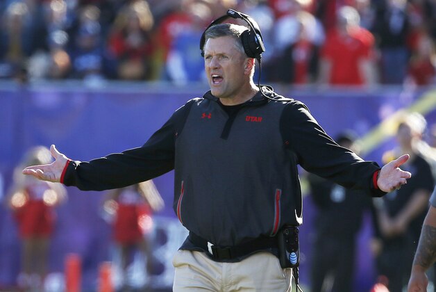 Utah head coach Kyle Whittingham looks toward the field against BYU during the first half of the Las Vegas Bowl NCAA college football game Saturday, Dec. 19, 2015, in Las Vegas. (AP Photo/John Locher)