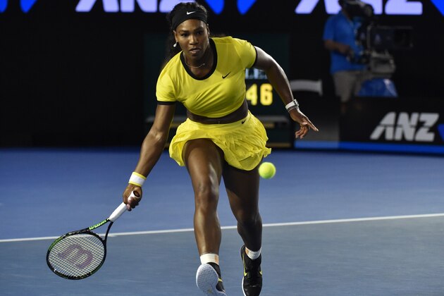 Serena Williams of the US plays a forehand return during her women's singles semi-final match against Poland's Agnieszka Radwanska on day eleven of the 2016 Australian Open tennis tournament in Melbourne on January 28, 2016. AFP PHOTO / SAEED KHAN-- IMAGE RESTRICTED TO EDITORIAL USE - STRICTLY NO COMMERCIAL USE / AFP / SAEED KHAN        (Photo credit should read SAEED KHAN/AFP/Getty Images)