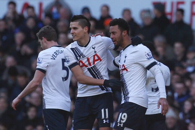 Tottenham Hotspur's Belgian midfielder Mousa Dembele (R) celebrates after scoring their second goal with Tottenham Hotspur's Argentinian midfielder Erik Lamela (C) during the English Premier League football match between Tottenham Hotspur and Sunderland at White Hart Lane in north London on January 16, 2016. AFP PHOTO / IAN KINGTONRESTRICTED TO EDITORIAL USE. No use with unauthorized audio, video, data, fixture lists, club/league logos or 'live' services. Online in-match use limited to 75 images, no video emulation. No use in betting, games or single club/league/player publications. / AFP / IAN KINGTON        (Photo credit should read IAN KINGTON/AFP/Getty Images)