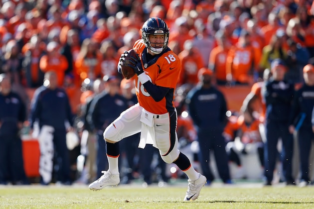 DENVER, CO - JANUARY 24:  Quarterback Peyton Manning #18 of the Denver Broncos rolls out to to pass during the AFC Championship game against the New England Patriots at Sports Authority Field at Mile High on January 24, 2016 in Denver, Colorado. The Broncos defeated the Patriots 20-18.  (Photo by Christian Petersen/Getty Images)
