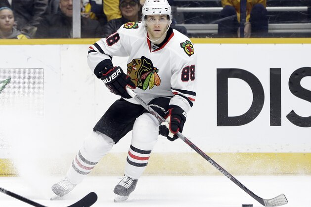 Chicago Blackhawks right wing Patrick Kane controls the puck against the Nashville Predators in the third period of an NHL hockey game Tuesday, Jan. 19, 2016, in Nashville, Tenn. Kane scored his 30th goal of the season to match his personal season high as the Blackhawks won 4-1 for their 12th win in a row. (AP Photo/Mark Humphrey) Chicago Blackhawks right wing Patrick Kane controls the puck against the Nashville Predators in the third period of an NHL hockey game Tuesday, Jan. 19, 2016, in Nashville, Tenn. Kane scored his 30th goal of the season to match his personal season high as the Blackhawks won 4-1 for their 12th win in a row. (AP Photo/Mark Humphrey)