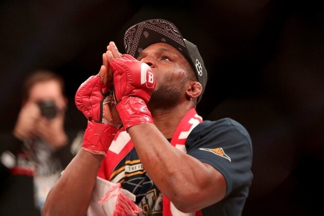 Paul Daley celebrates a win against Andre Santos during their fight at Bellator 134 on Friday, Feb. 27, 2015, in Uncasville, CT.  Daley won the fight via decision. (AP Photo/Gregory Payan)