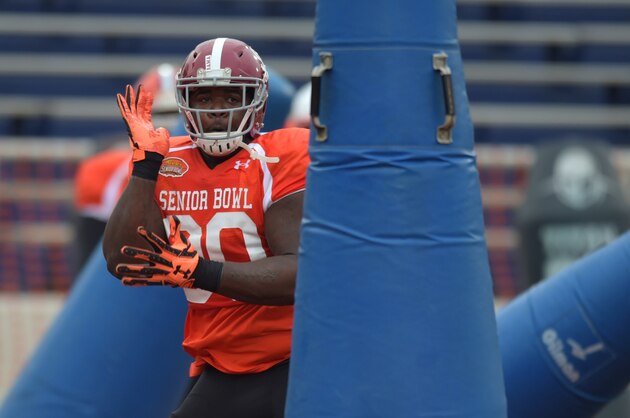 Jan 27, 2016; Mobile, AL, USA; South squad defensive end Jarran Reed of Alabama (90) works his way through a tackling dummy drill during Senior Bowl practice at Ladd-Peebles Stadium. Mandatory Credit:  Glenn Andrews-USA TODAY Sports